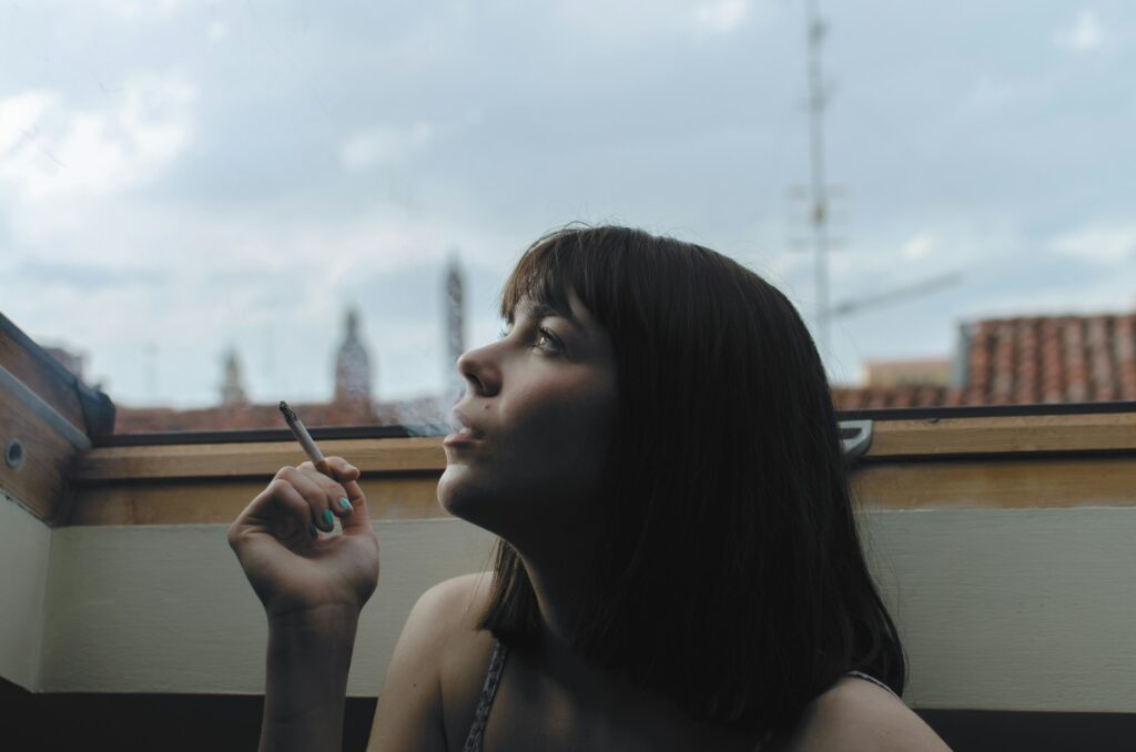 woman smoking a cigarette